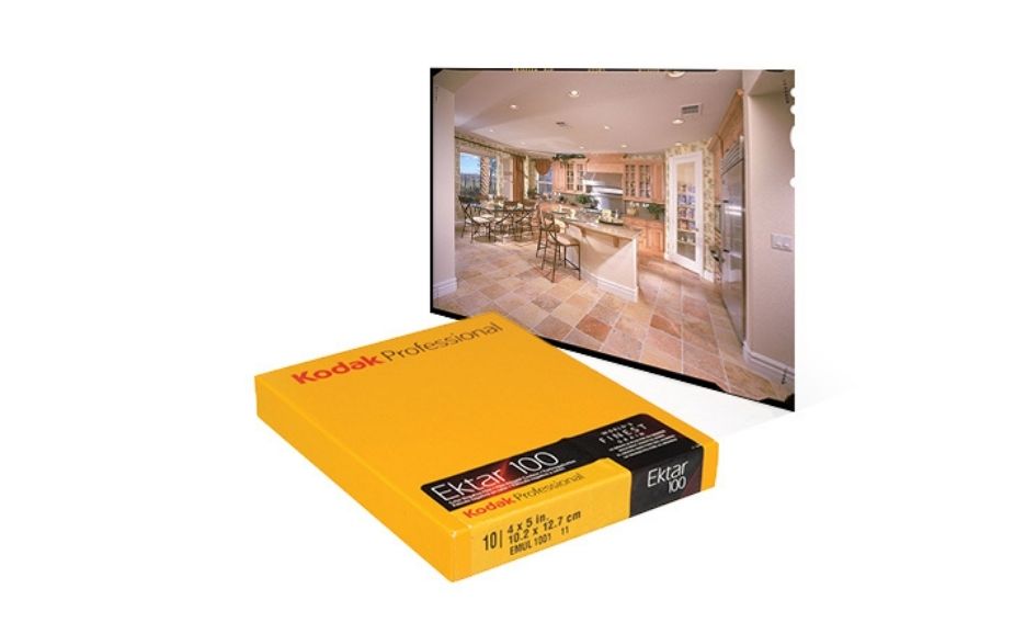 Large format sheet film in the dip and dunk processor